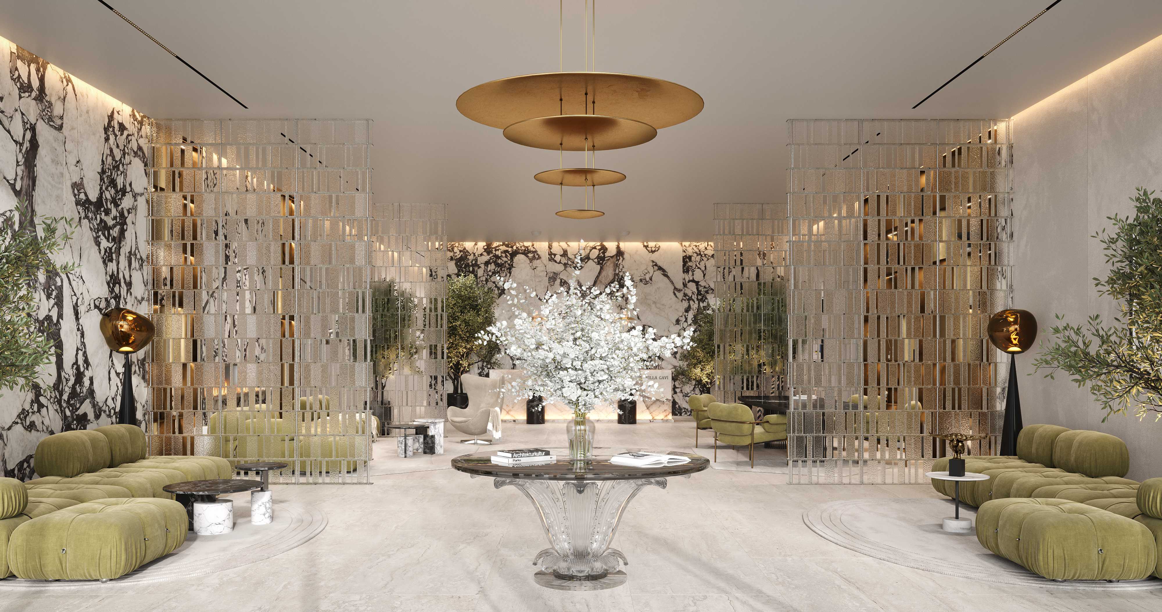 Marble lobby with glass screens, green velvet sofas and crystal centre table