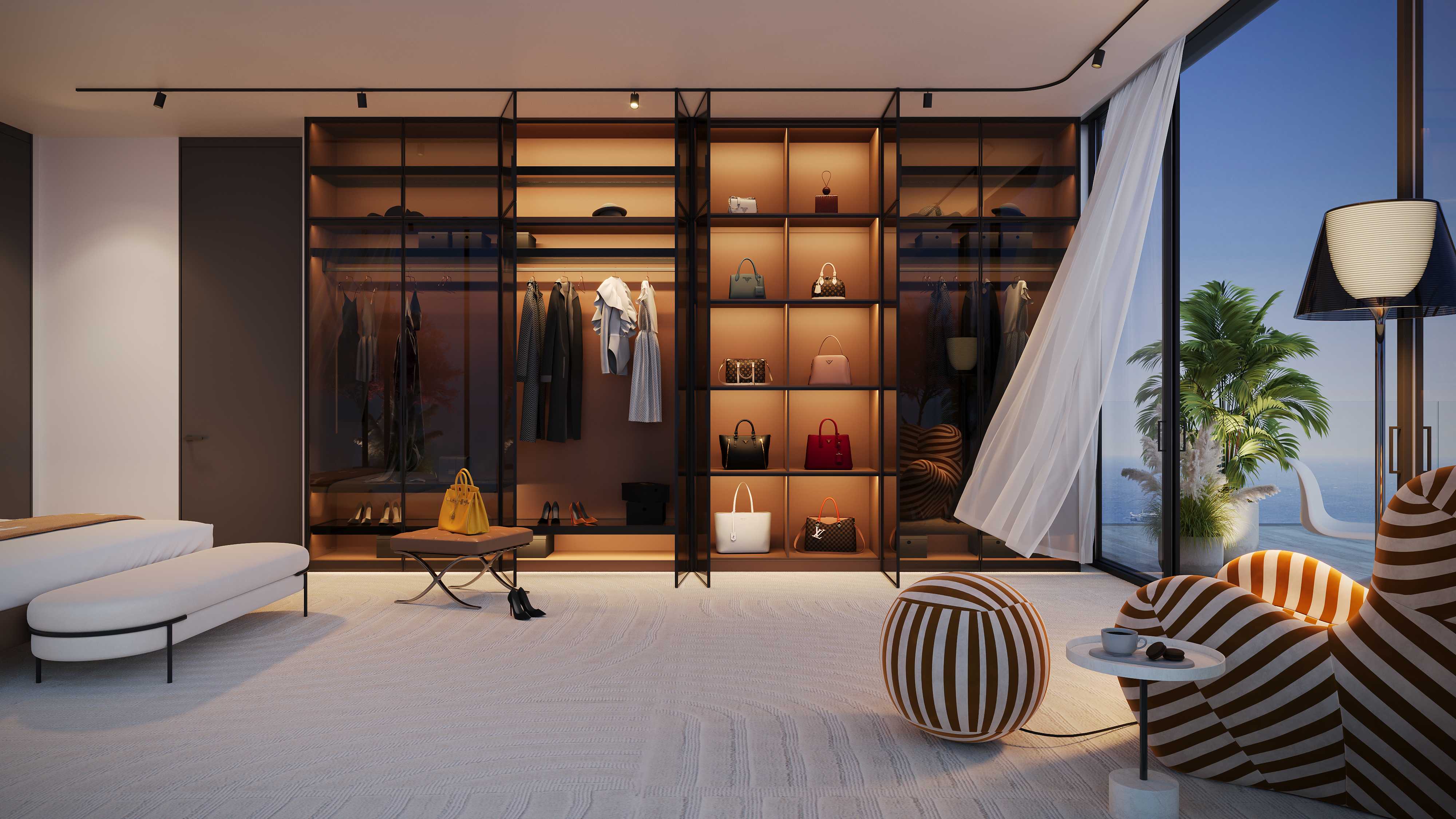 Lit glass-fronted wardrobe wall in a carpeted bedroom by the windows
