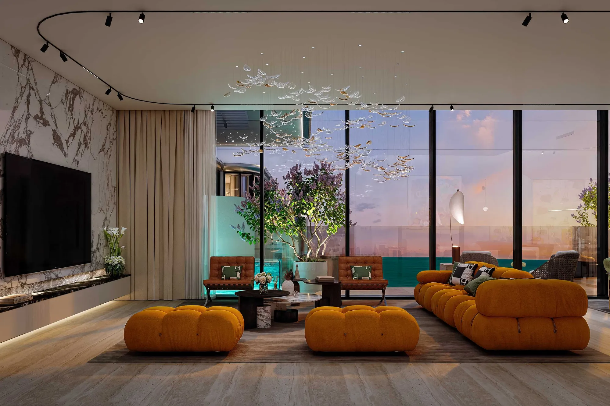 Large living room with marble wall, glass chandelier and evening sea view